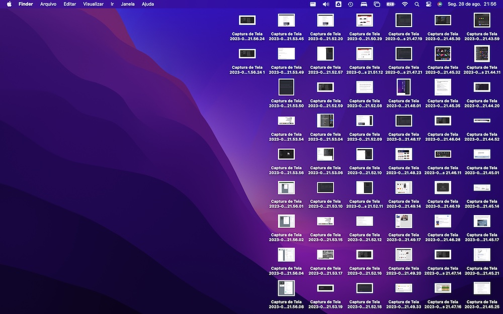 PrintScreen da Mesa de um MacOS com mais de metade da tela tomada por arquivos resultantes de printscreens feitos ao longo de um dia